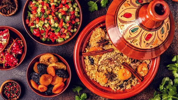Dig into Morocco’s diverse cuisine, a fusion of cultural influences — Amazigh, Arab, Jewish, and French — including its beloved staple, couscous