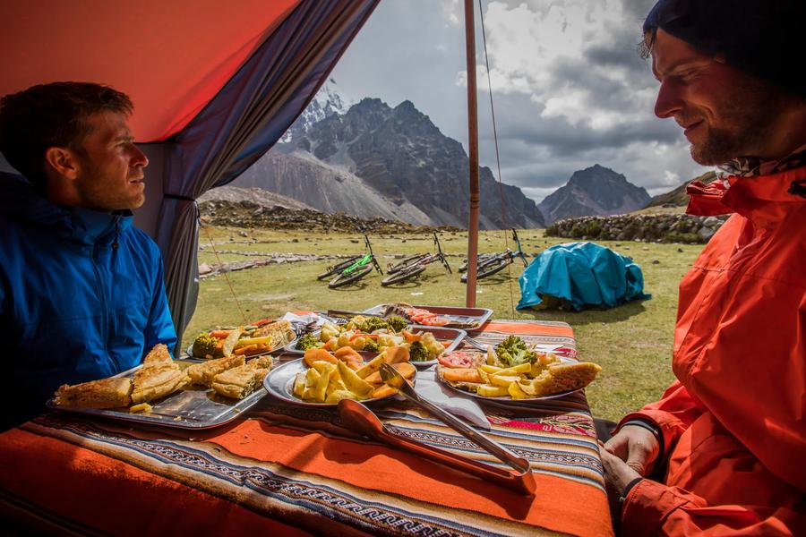 From crispy picarones to smoky pollo a la brasa, here are a dozen traditional Peruvian eats to explore