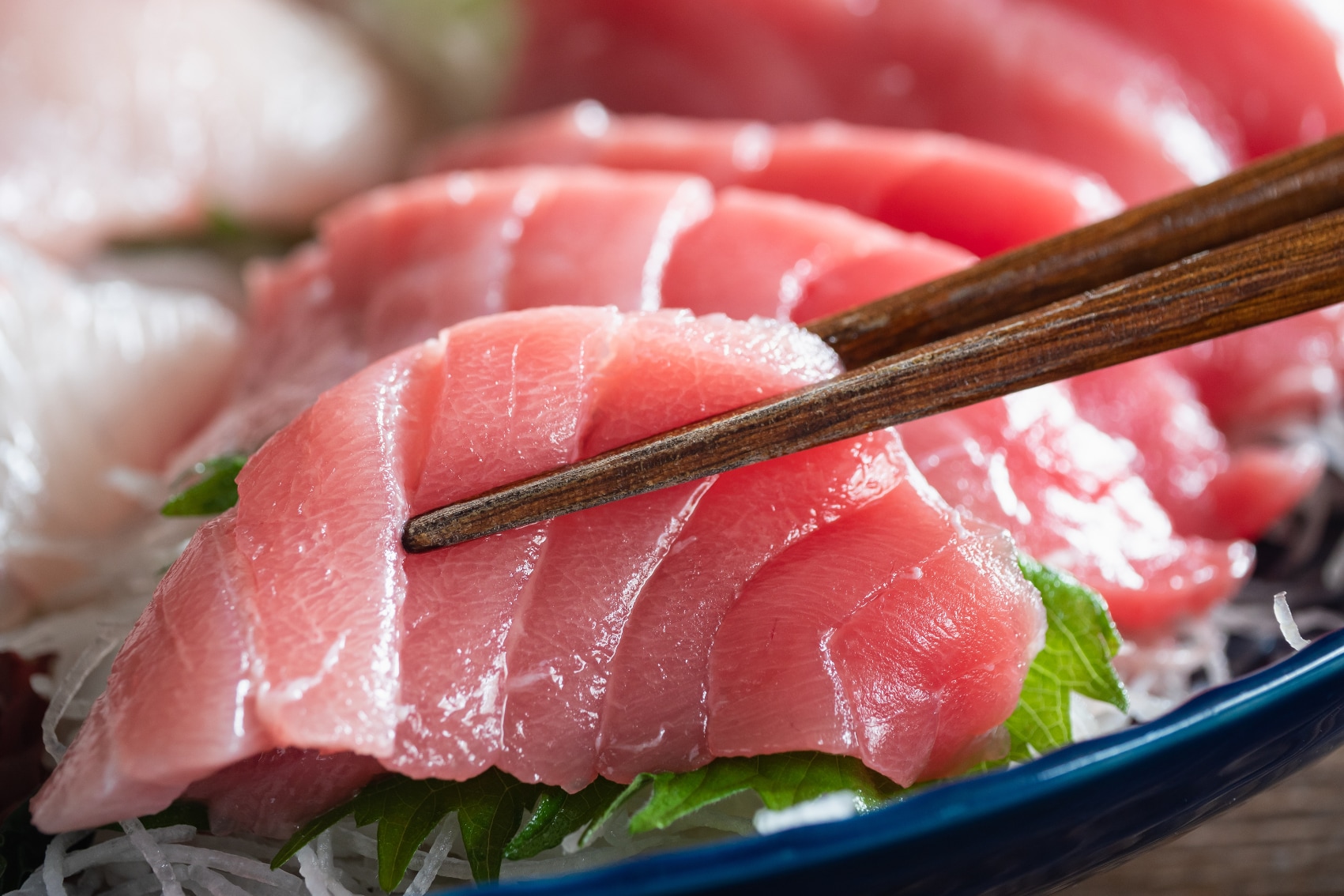 Fresh raw thinly sliced fish 